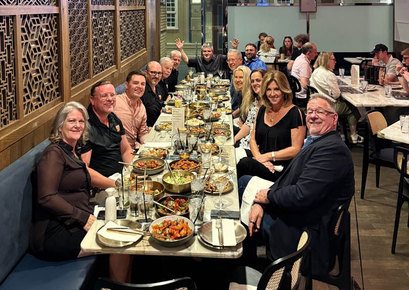 Our team enjoying dinner with owners after the show